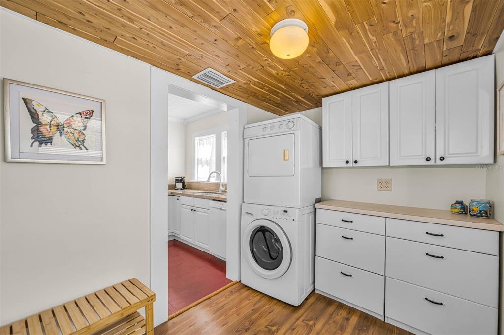 525 Bay Street Dunedin, FL 34698 - Photo 22 of 38 a utility room with sink dryer and washer