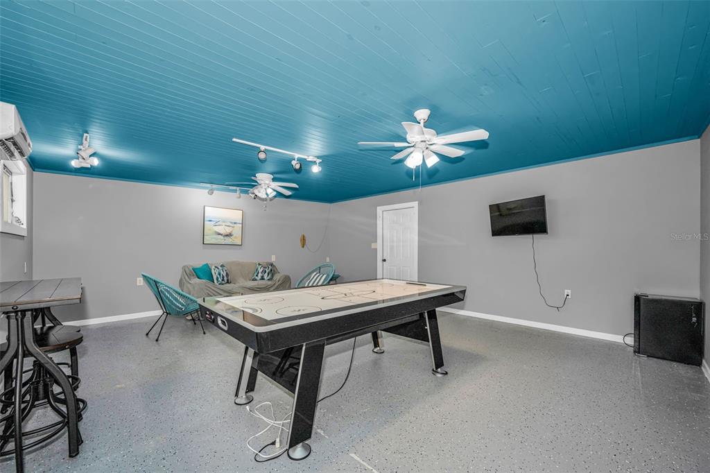 525 Bay Street Dunedin, FL 34698 - Photo 28 of 38 a view of a workspace with furniture