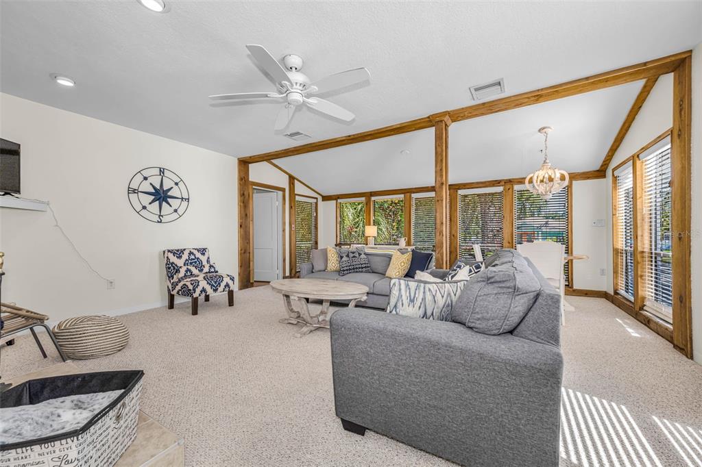 525 Bay Street Dunedin, FL 34698 - Photo 5 of 38 a living room with furniture and a large window