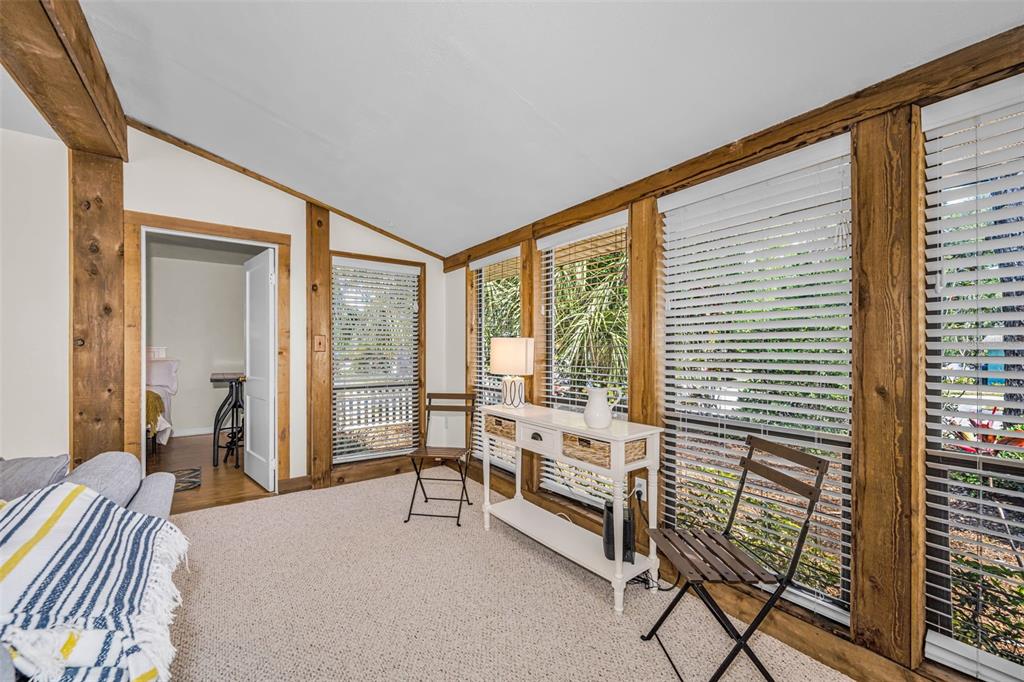525 Bay Street Dunedin, FL 34698 - Photo 6 of 38 a bedroom with furniture and a window