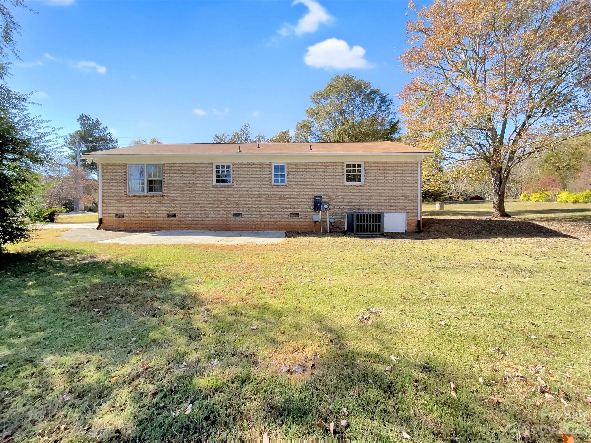 1904 Bess Town Road Bessemer City, NC 28016 - Photo 17 of 18 a view of a house with a big yard