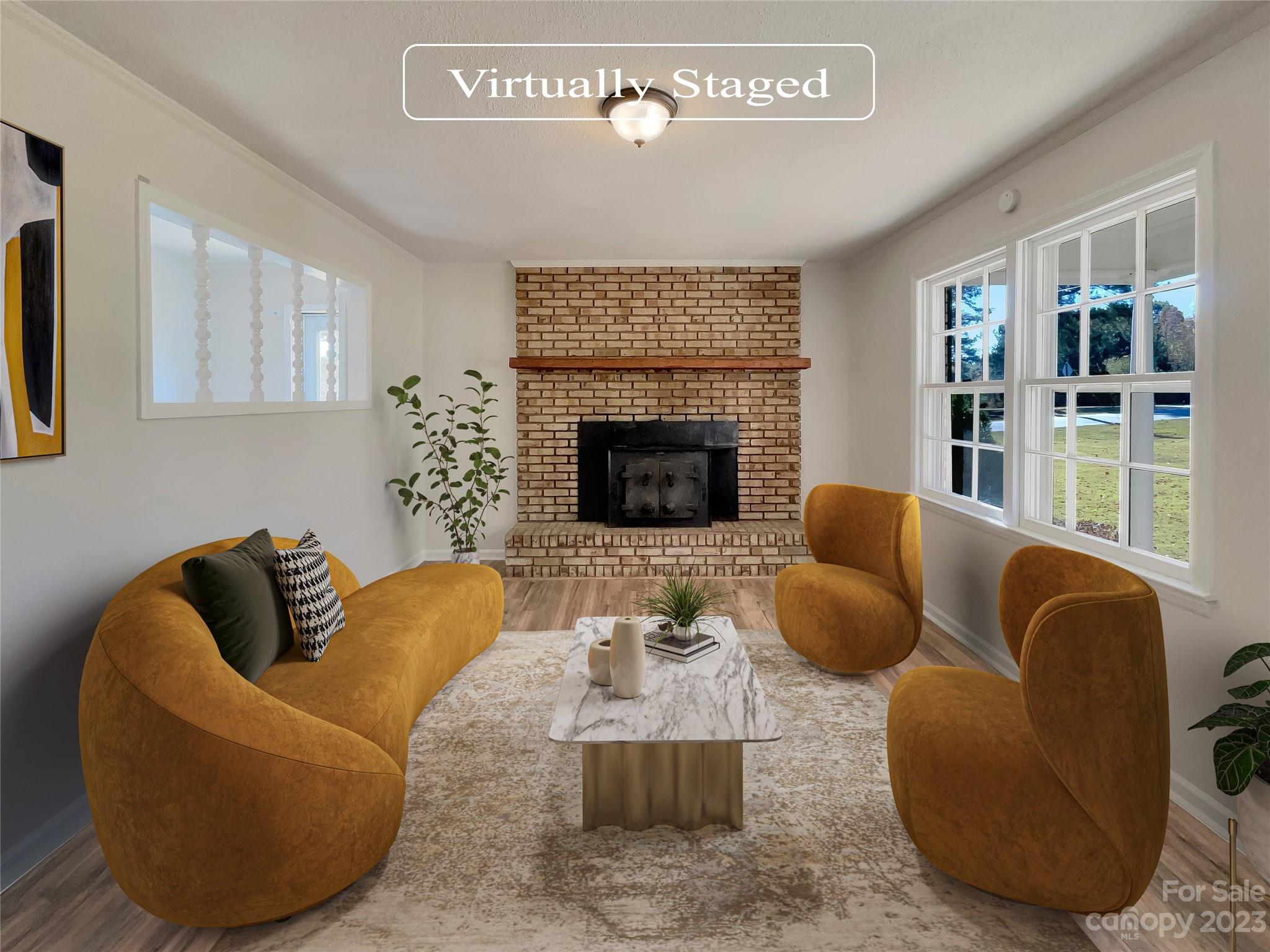 1904 Bess Town Road Bessemer City, NC 28016 - Photo 2 of 18 a living room with furniture and a fireplace