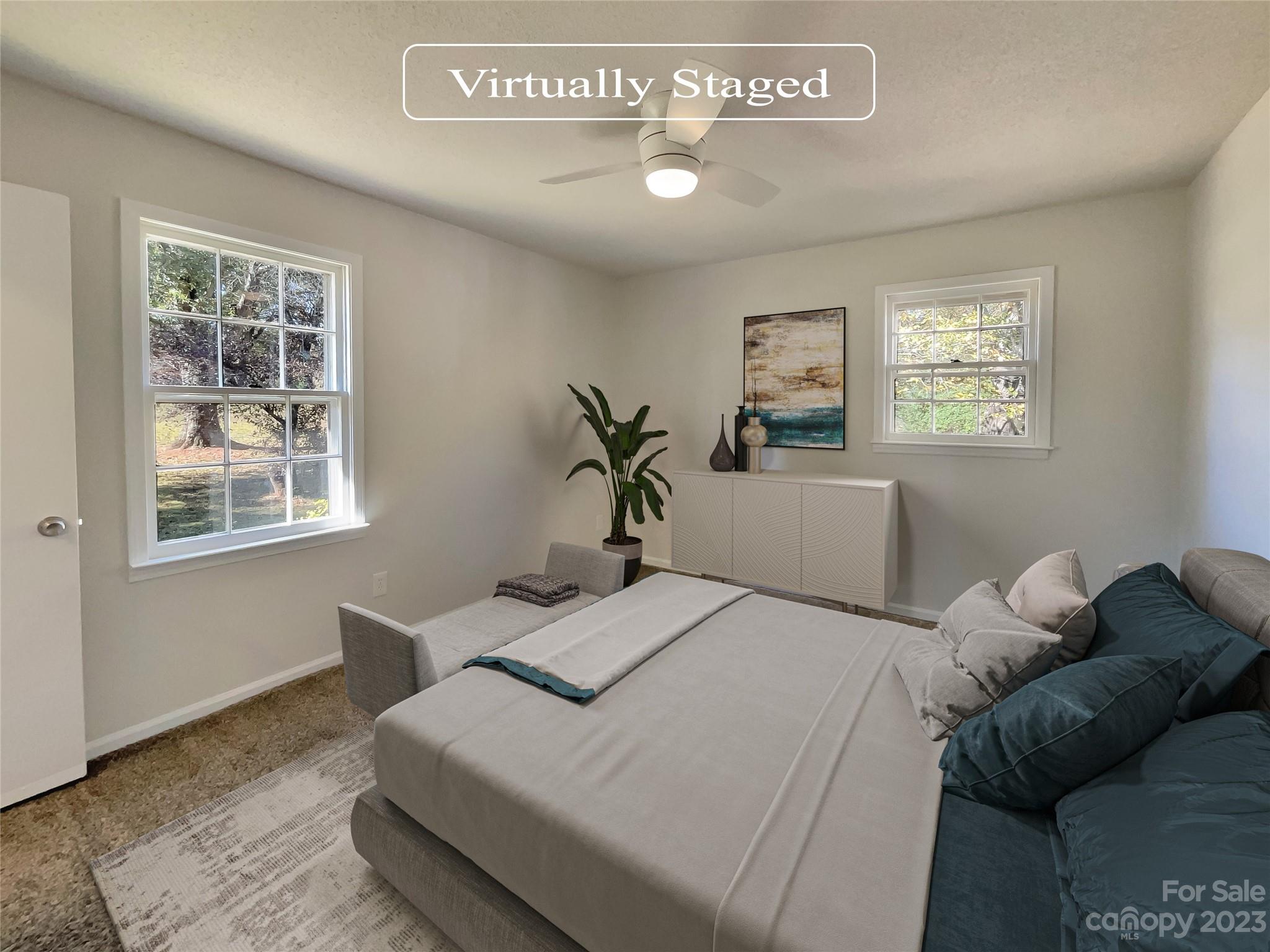 1904 Bess Town Road Bessemer City, NC 28016 - Photo 4 of 18 a bedroom with a bed and wooden floor