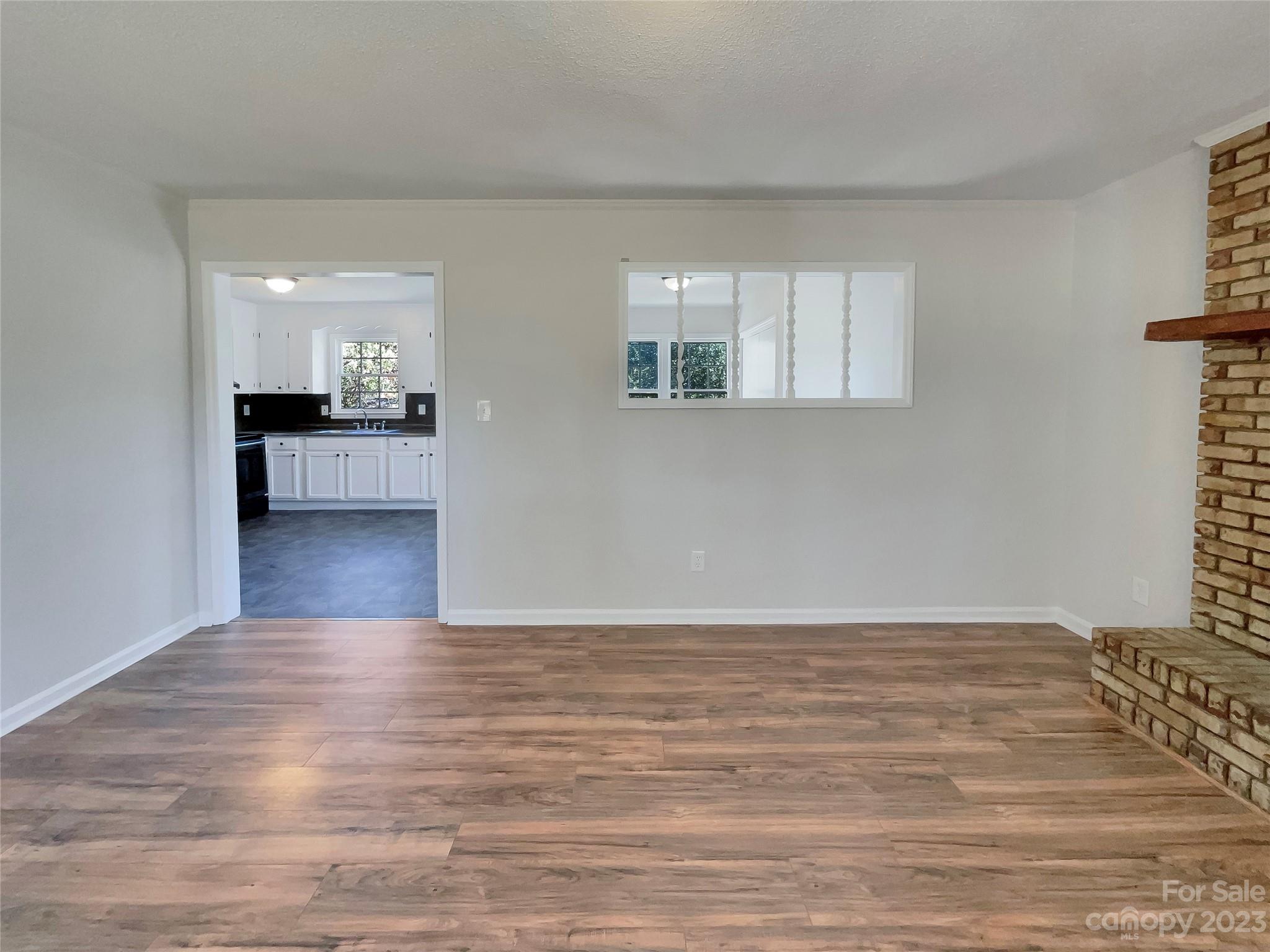 1904 Bess Town Road Bessemer City, NC 28016 - Photo 6 of 18 a view of a kitchen and a window