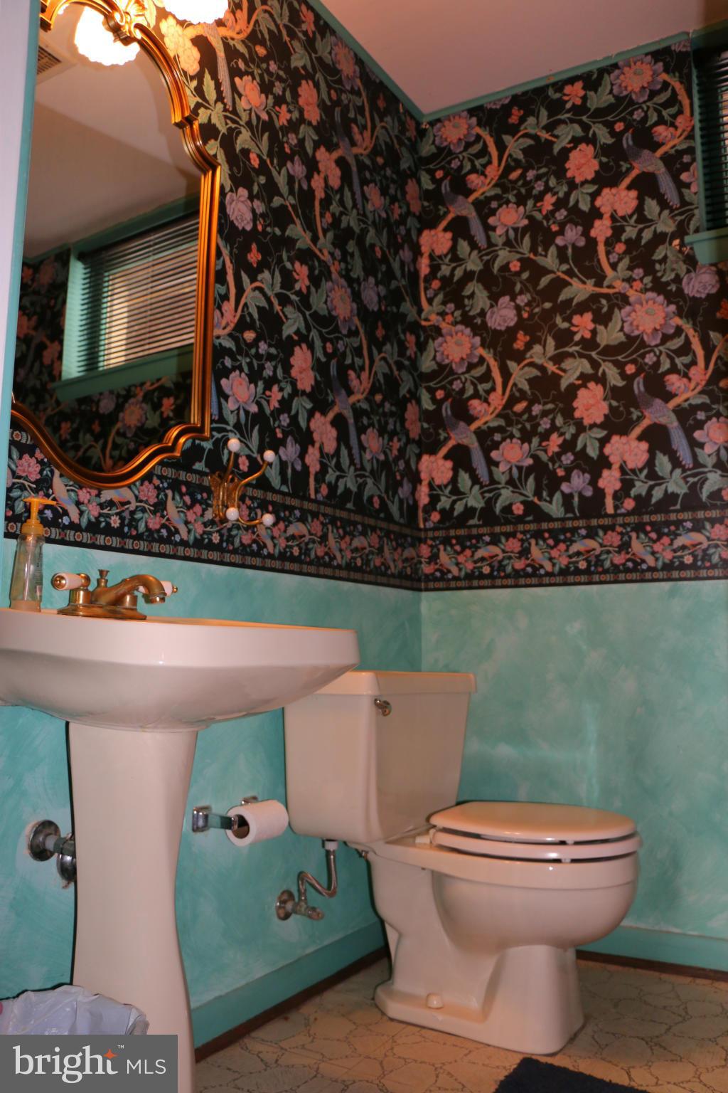 13831 Manor Road Baldwin, MD 21013 - Photo 18 of 20 a bathroom with a toilet and a sink