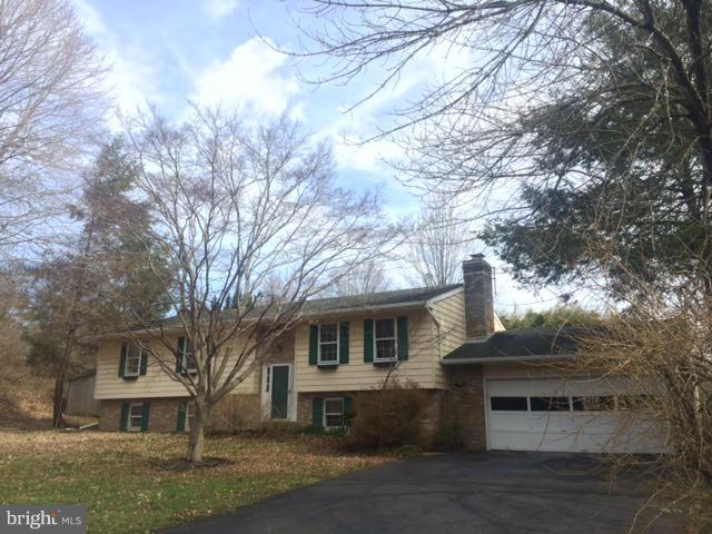 13831 Manor Road Baldwin, MD 21013 - Photo 20 of 20 a front view of a house with a garden