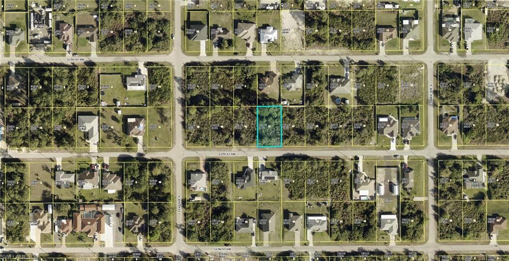 2612 12th Street Southwest Lehigh Acres, FL 33976 - Photo 2 of 2 large aerial view of a building