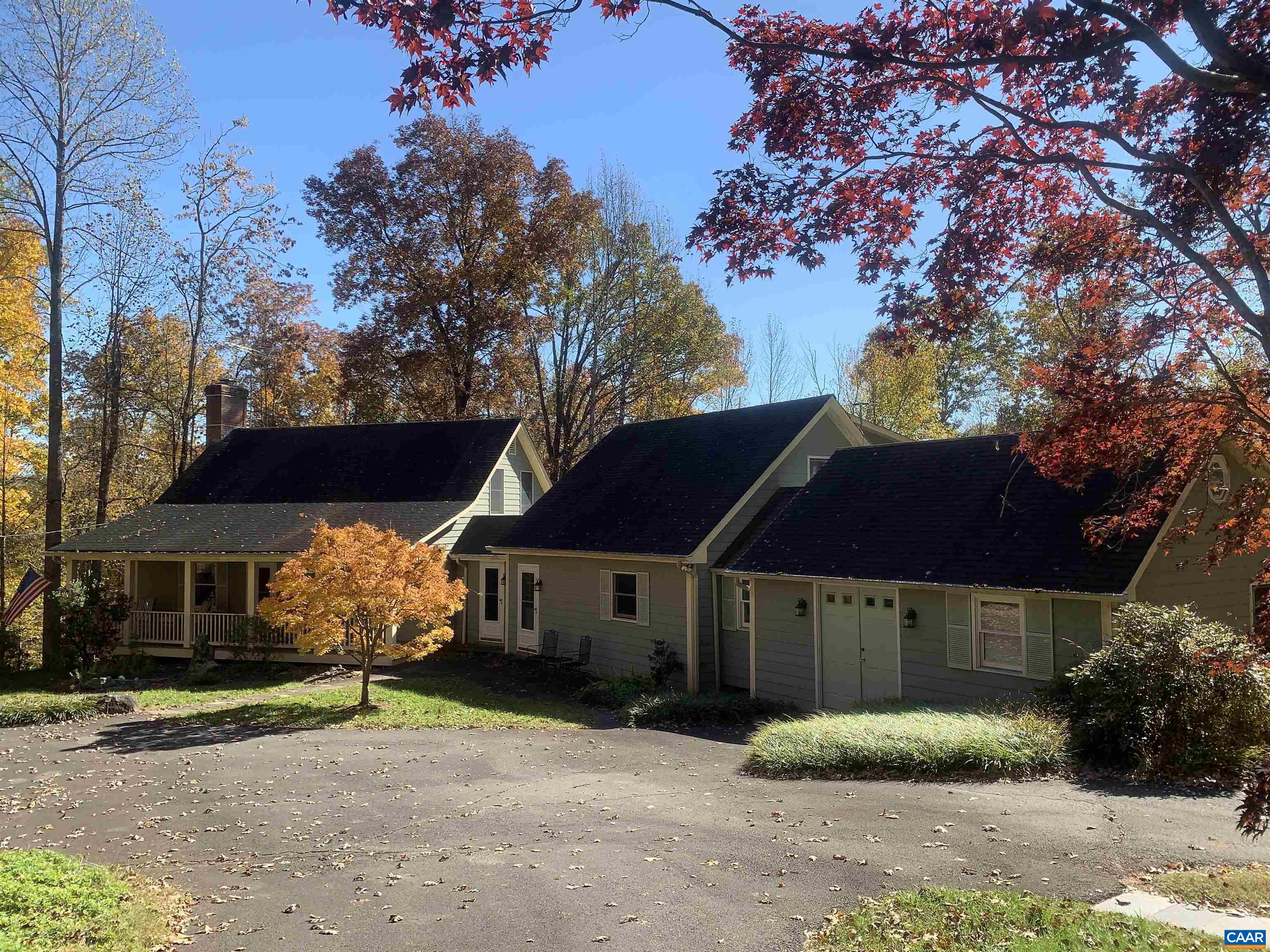 3034 Thrift Road Madison, VA 22727 - Photo 1 of 26 a front view of a house with a yard and garage