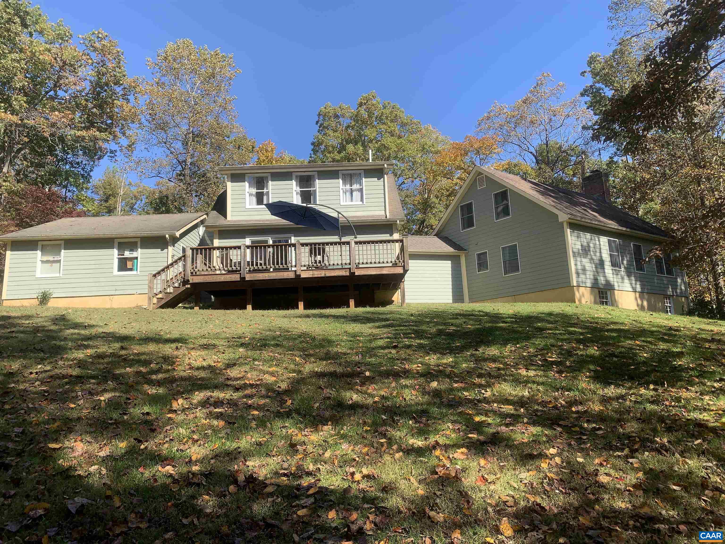 3034 Thrift Road Madison, VA 22727 - Photo 5 of 26 a front view of a house with a garden