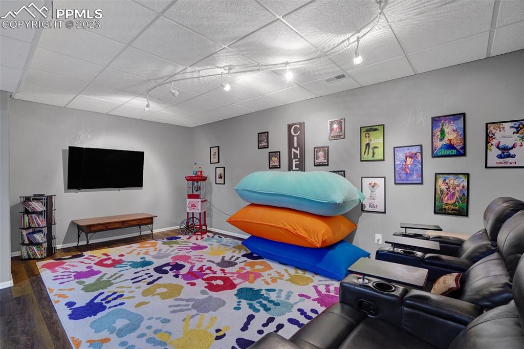 3805 Curtis Road Peyton, CO 80831 - Photo 36 of 48 a bedroom with furniture and a flat screen tv