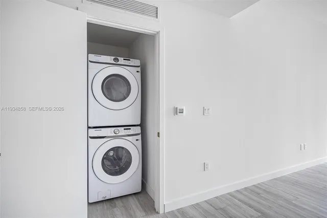 a utility room with dryer and washer