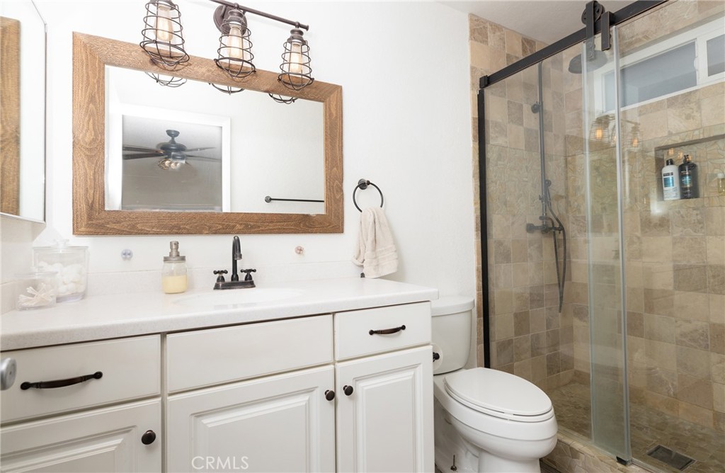 6667 King Street Chino, CA 91710 - Photo 11 of 21 a bathroom with a sink a toilet and shower