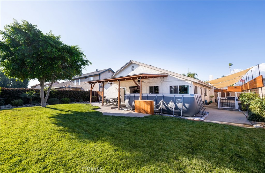 6667 King Street Chino, CA 91710 - Photo 17 of 21 a front view of house with yard and outdoor seating