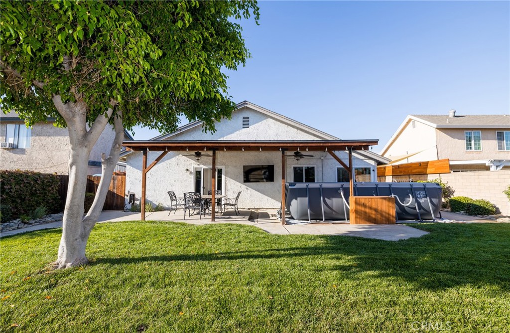 6667 King Street Chino, CA 91710 - Photo 18 of 21 a front view of house with yard and outdoor seating