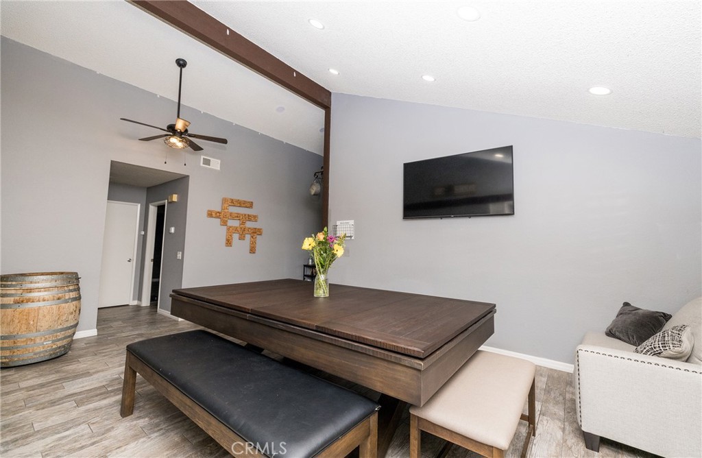 6667 King Street Chino, CA 91710 - Photo 6 of 21 a living room with furniture and a flat screen tv