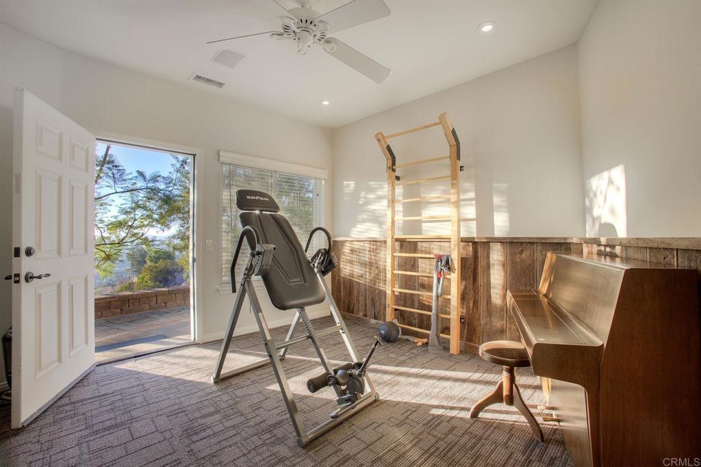 31220 Aquaduct Road Bonsall, CA 92003 - Photo 25 of 36 a view of a room with gym equipment