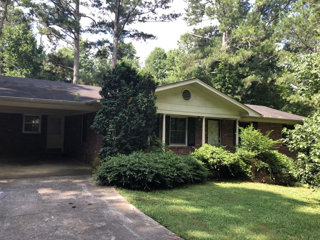 4943 Bird Road Gainesville, GA 30506 - Photo 1 of 1 a front view of a house with garden