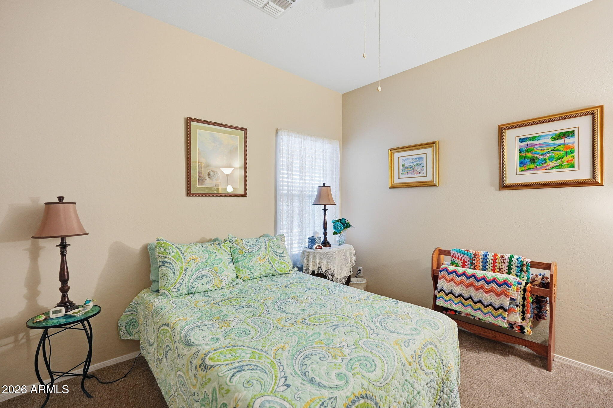 2101 South Meridian Road, Unit 164 Apache Junction, AZ 85120 - Photo 13 of 29 a bedroom with a bed and a lamp on table