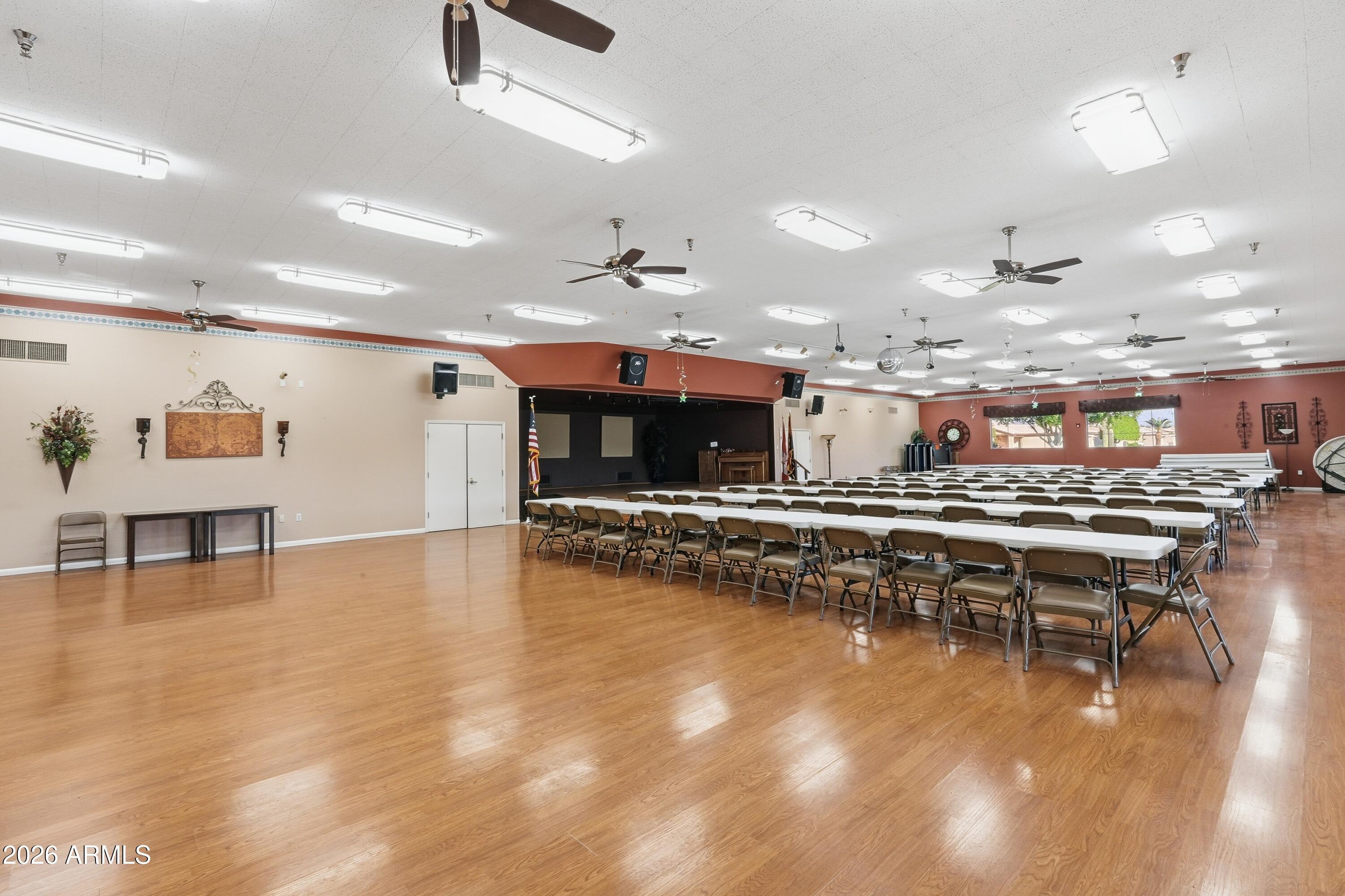 2101 South Meridian Road, Unit 164 Apache Junction, AZ 85120 - Photo 22 of 29 a kitchen with a table and chairs in it