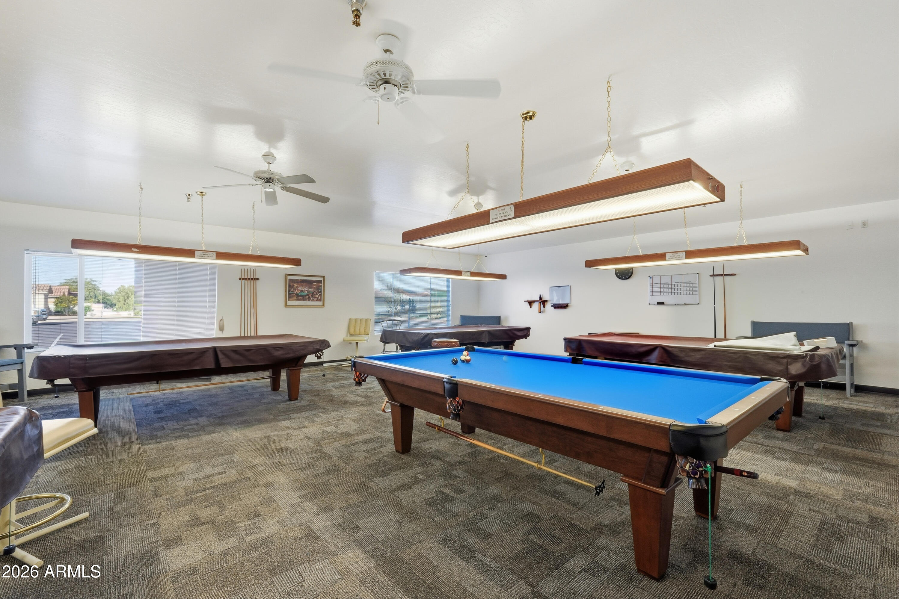 2101 South Meridian Road, Unit 164 Apache Junction, AZ 85120 - Photo 23 of 29 a room with furniture pool table and wooden floor