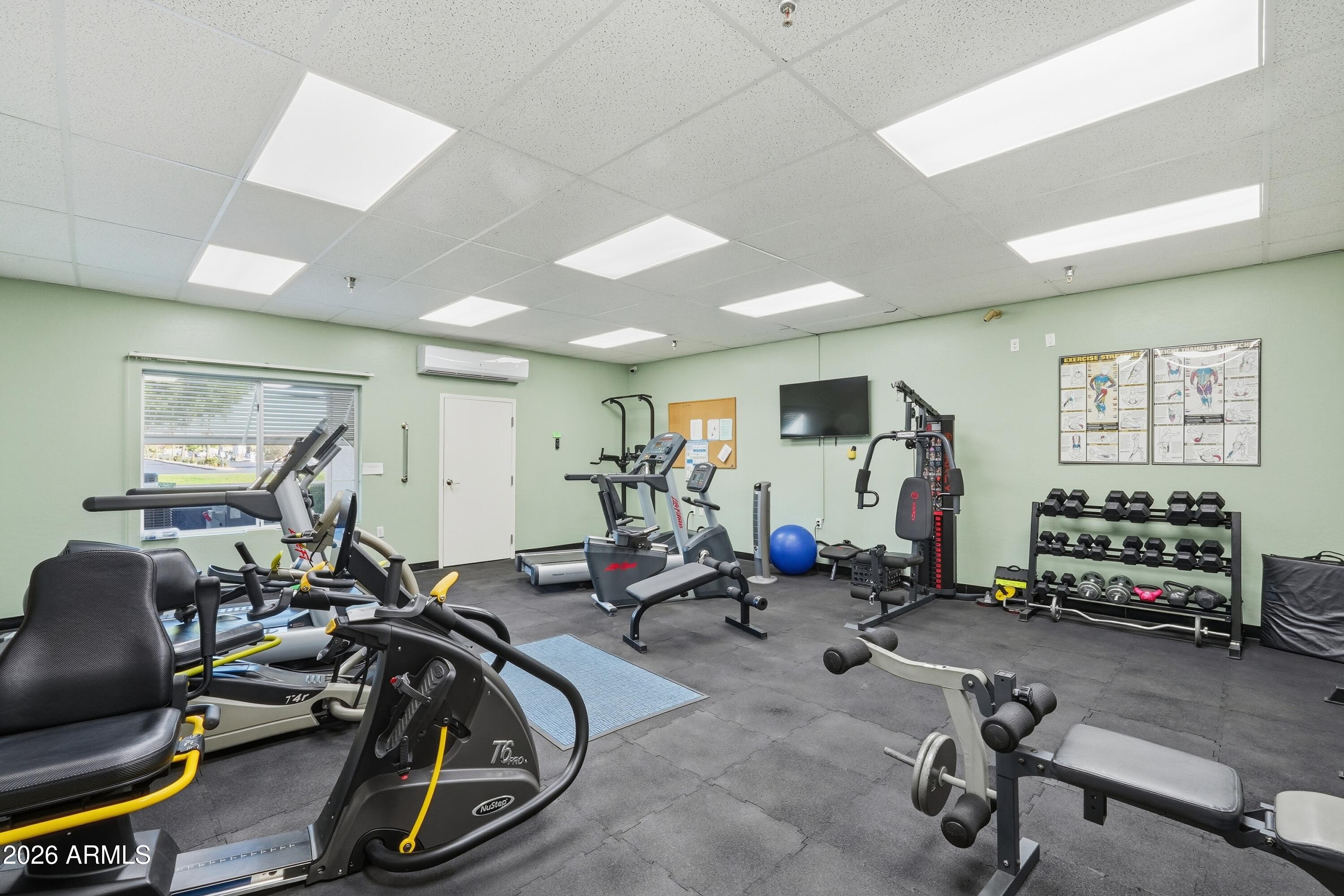 2101 South Meridian Road, Unit 164 Apache Junction, AZ 85120 - Photo 25 of 29 a view of a room with gym equipment