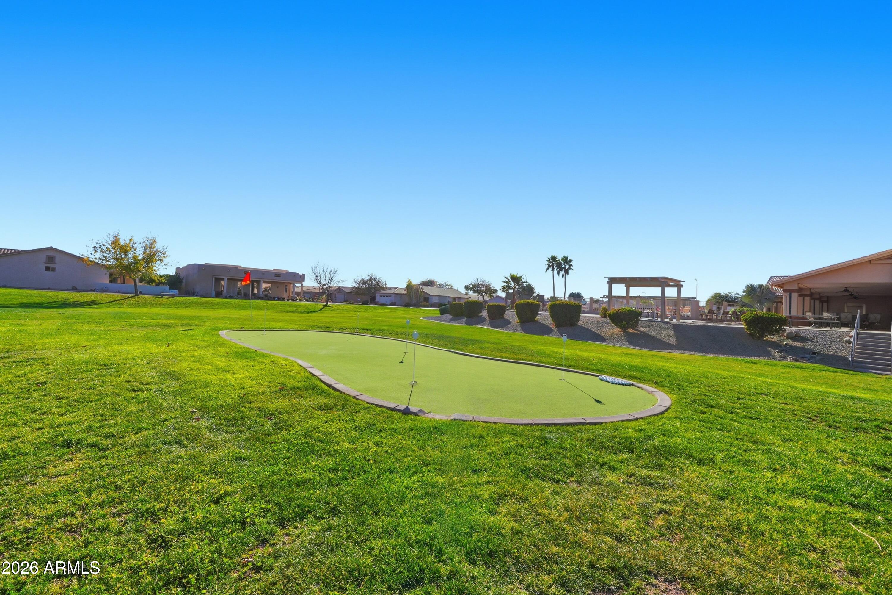 2101 South Meridian Road, Unit 164 Apache Junction, AZ 85120 - Photo 29 of 29 a view of a golf course with a lake
