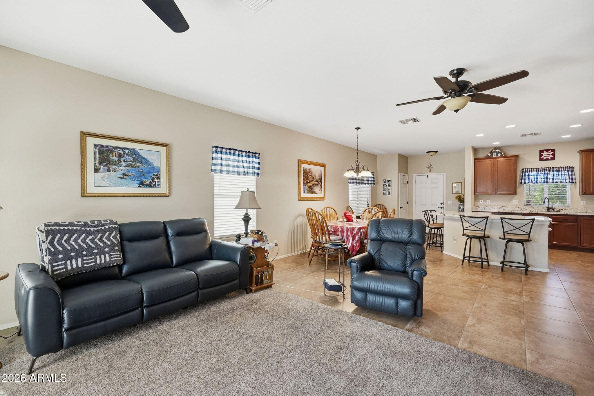 2101 South Meridian Road, Unit 164 Apache Junction, AZ 85120 - Photo 8 of 29 a living room with furniture and a view of kitchen