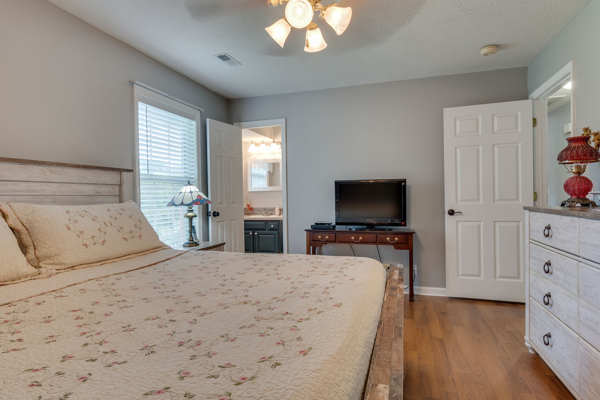 2143 Lee Road Spring Hill, TN 37174 - Photo 16 of 25 a bedroom with a bed and a flat screen television