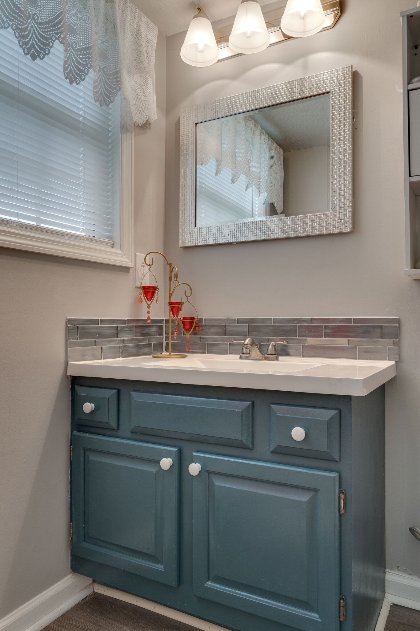 2143 Lee Road Spring Hill, TN 37174 - Photo 17 of 25 a sink with a sink and cabinets
