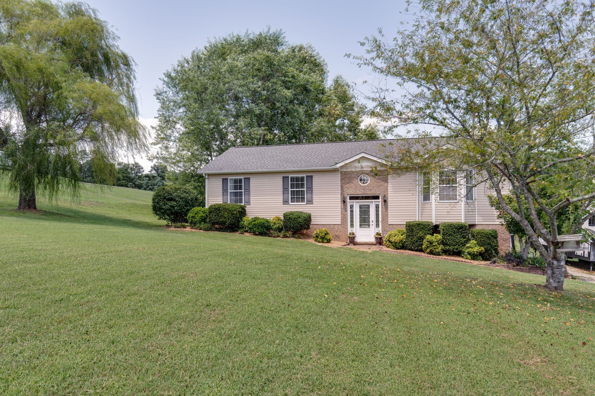 2143 Lee Road Spring Hill, TN 37174 - Photo 2 of 25 a front view of a house with a yard