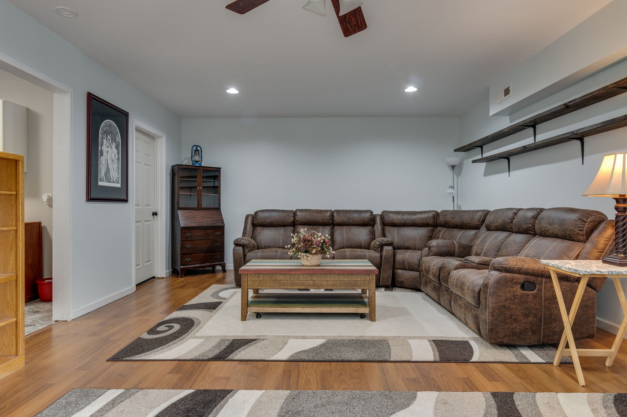 2143 Lee Road Spring Hill, TN 37174 - Photo 21 of 25 a living room with furniture and a rug