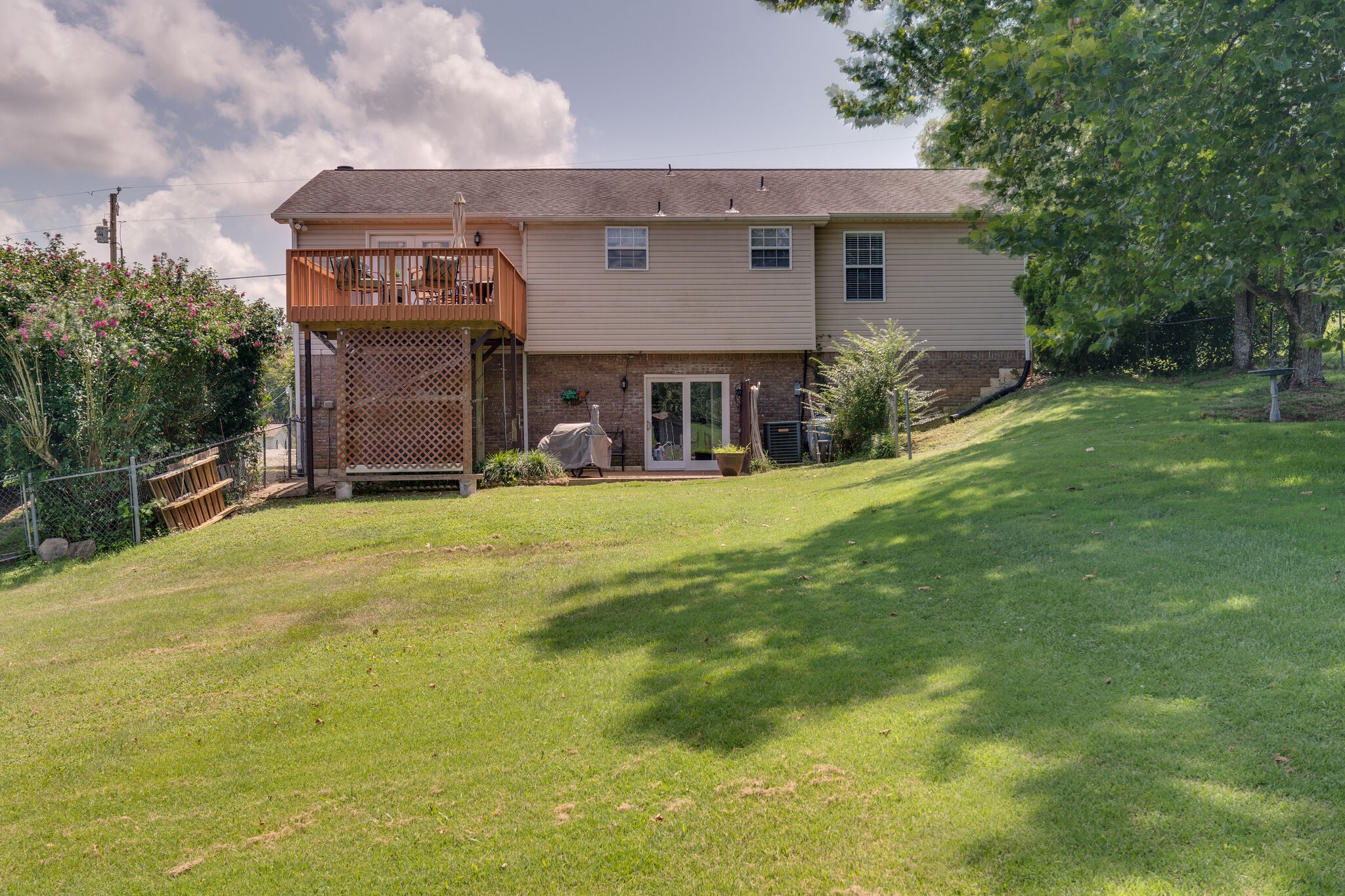 2143 Lee Road Spring Hill, TN 37174 - Photo 25 of 25 a view of a house with a yard and garage