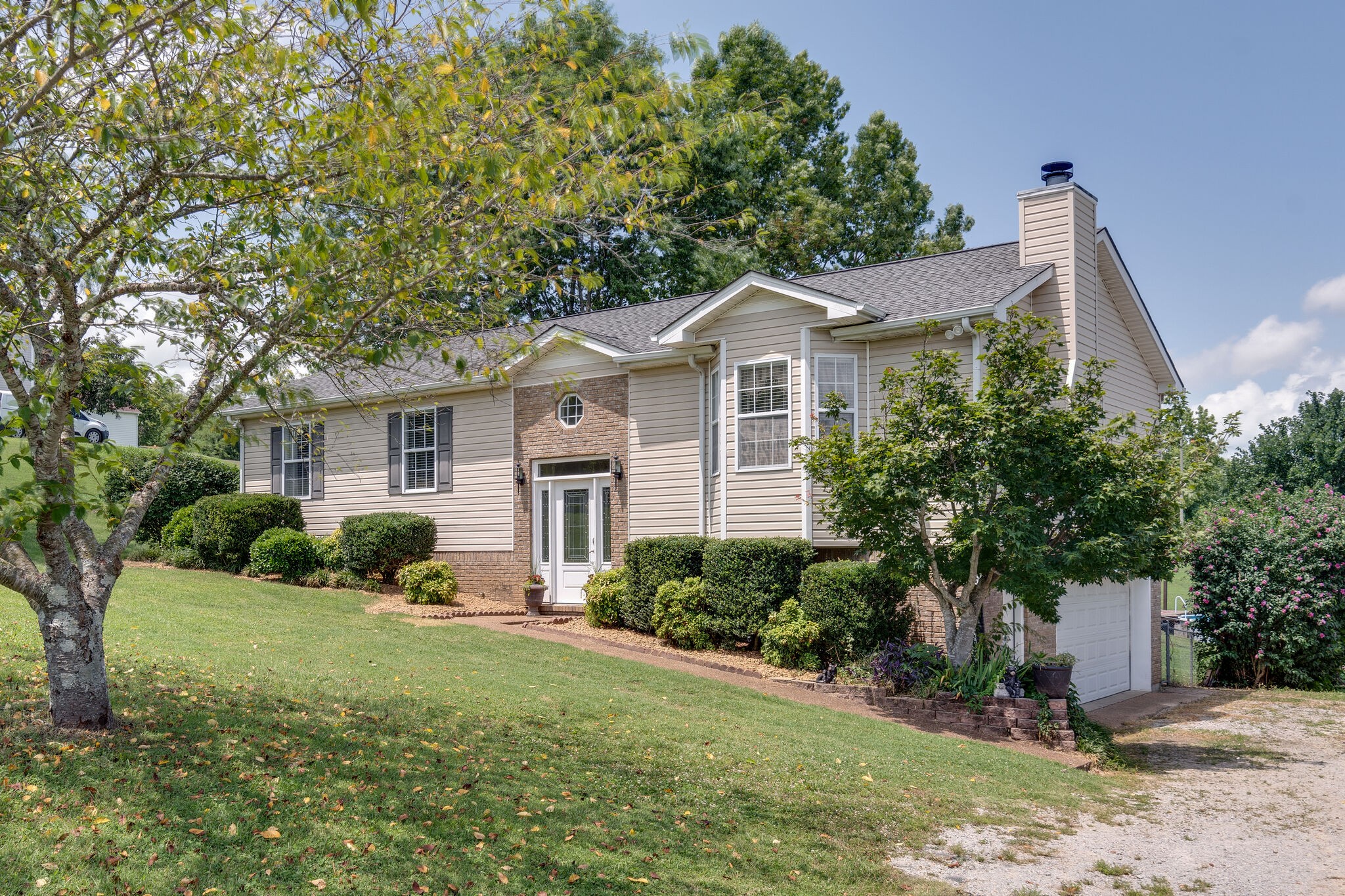 2143 Lee Road Spring Hill, TN 37174 - Photo 3 of 25 a front view of house with yard and green space