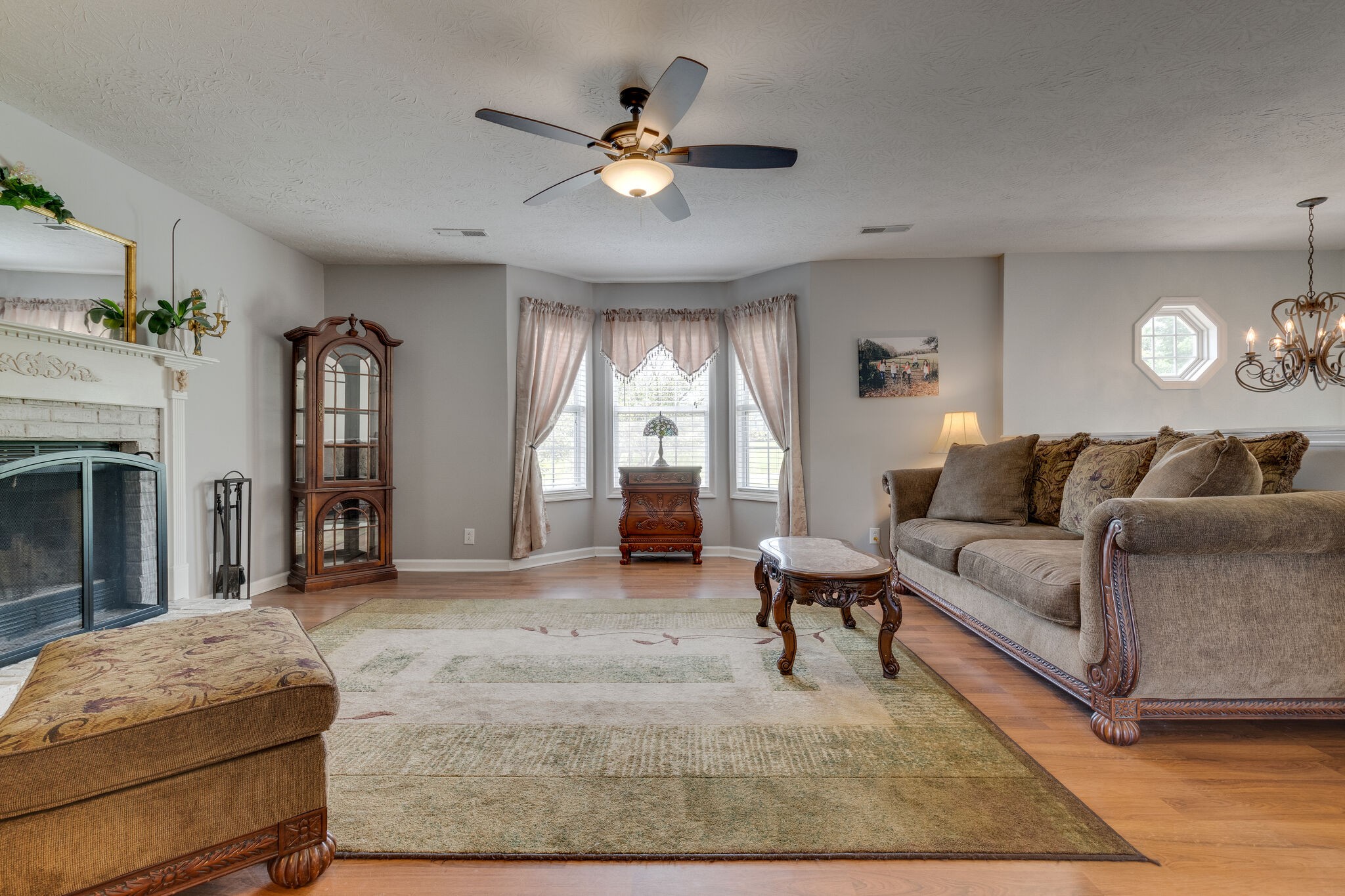 2143 Lee Road Spring Hill, TN 37174 - Photo 8 of 25 a living room with furniture and a large window