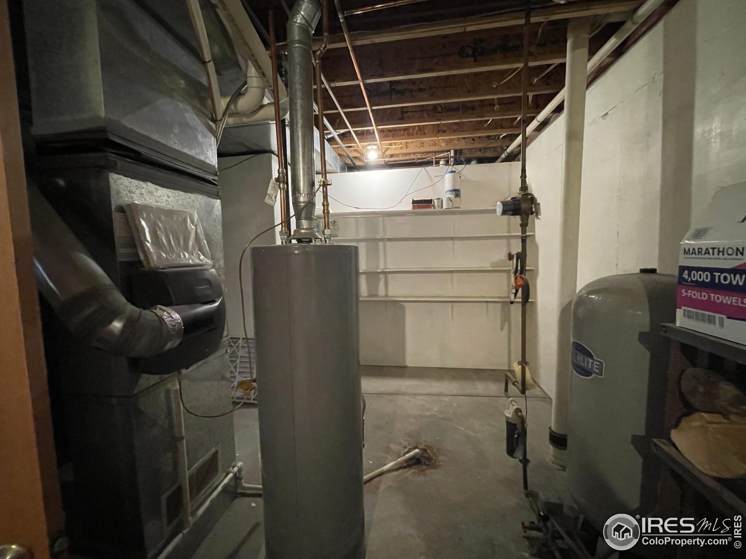 141 Tami Road Red Feather Lakes, CO 80545 - Photo 29 of 49 a utility room with dryer and washer