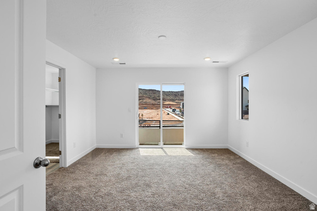 2194 Wolverine Way, Unit 2531 Washington, UT 84780 - Photo 23 of 52 Carpeted room with a sliding glass door opening to a balcony