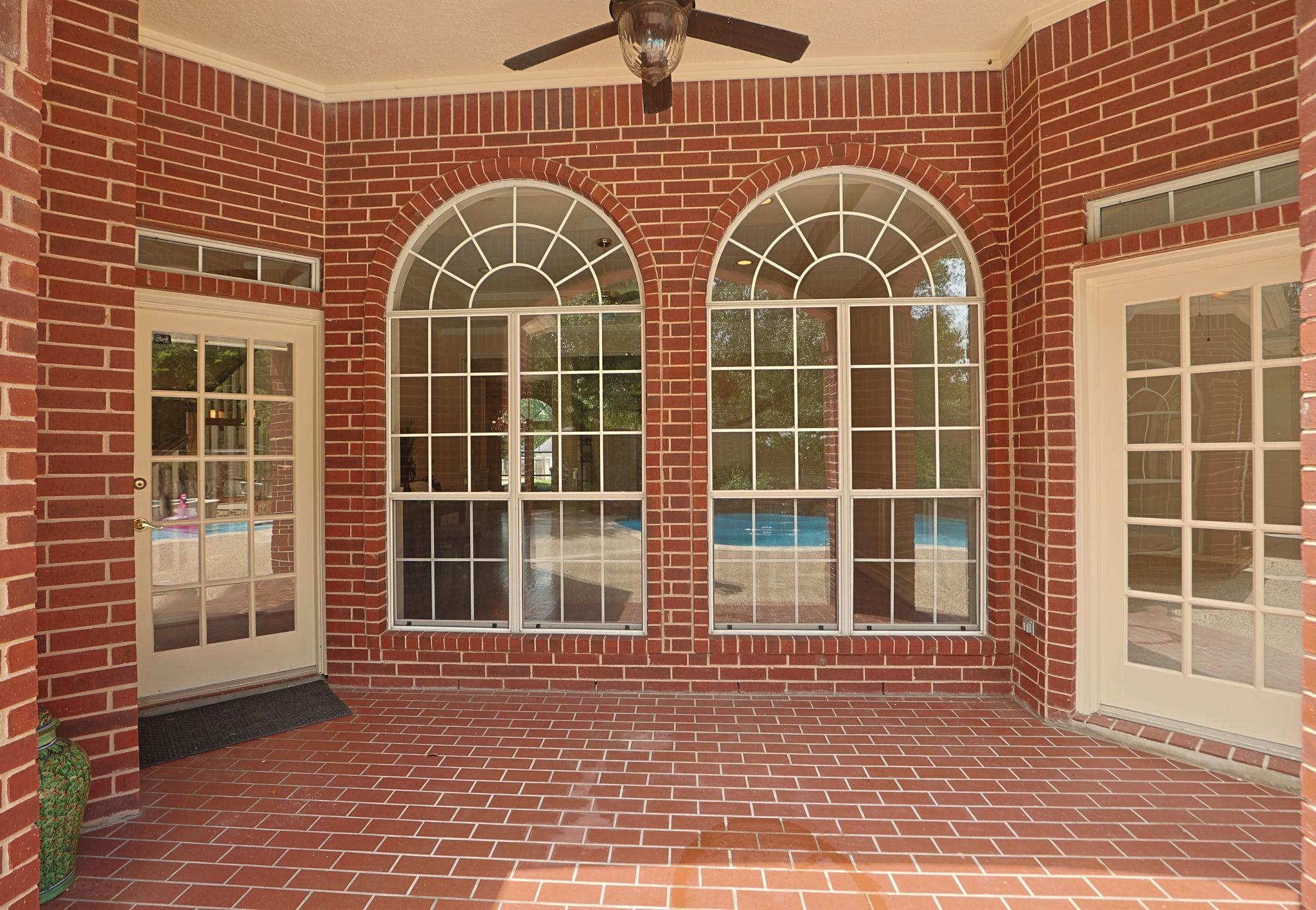 18310 Pamela Way Spring, TX 77379 - Photo 36 of 42 The covered patio can be accessed from both the family room and the primary suite.