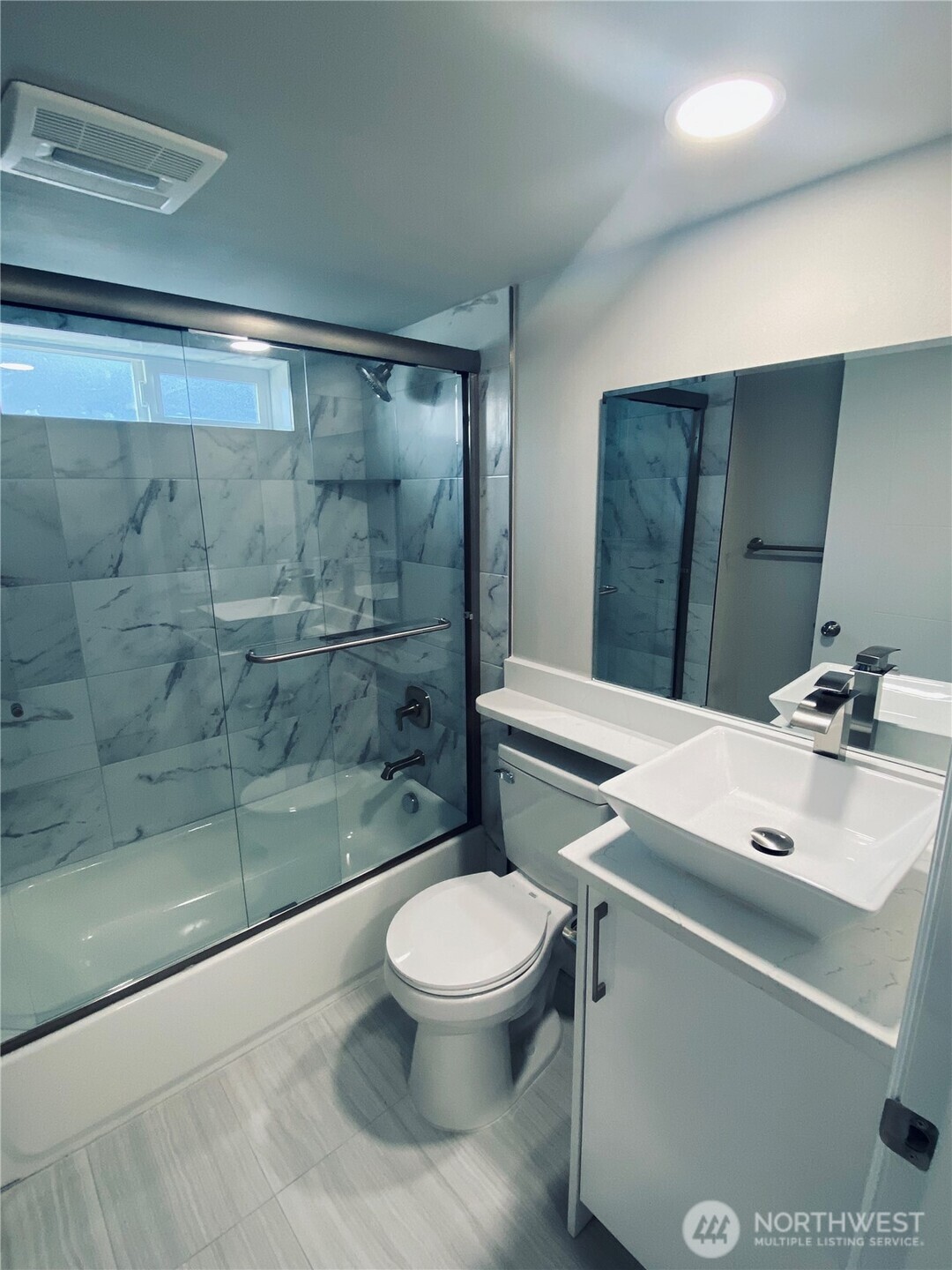 3405 Rockefeller Avenue, Unit C Everett, WA 98201 - Photo 7 of 15 a bathroom with a sink toilet and shower