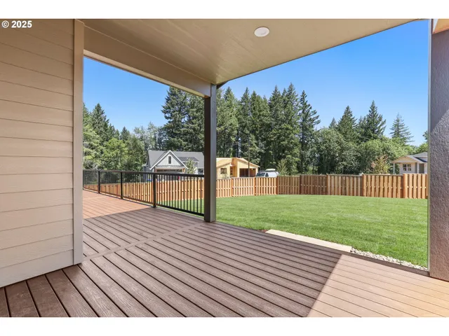 a view of a backyard with wooden floor