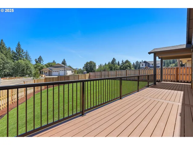 a view of balcony with wooden floor