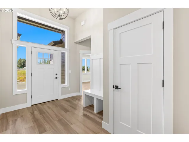 a view of empty room with front door