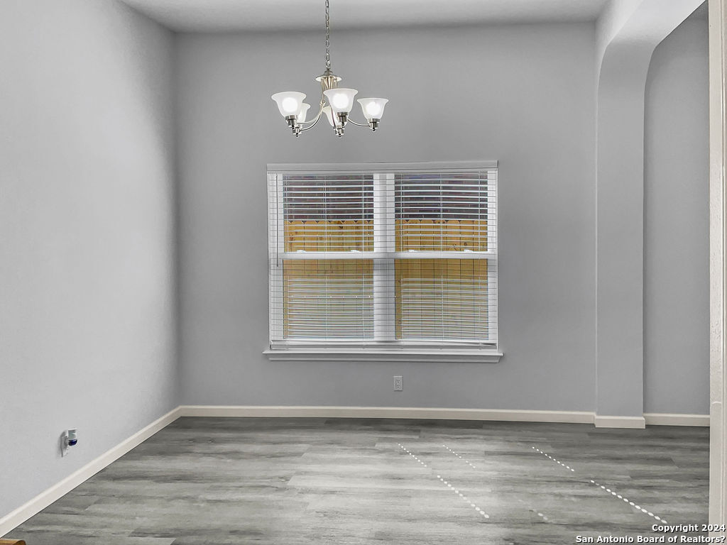 13211 Huntsman Road San Antonio, TX 78249 - Photo 13 of 33 a view of an empty room with a window