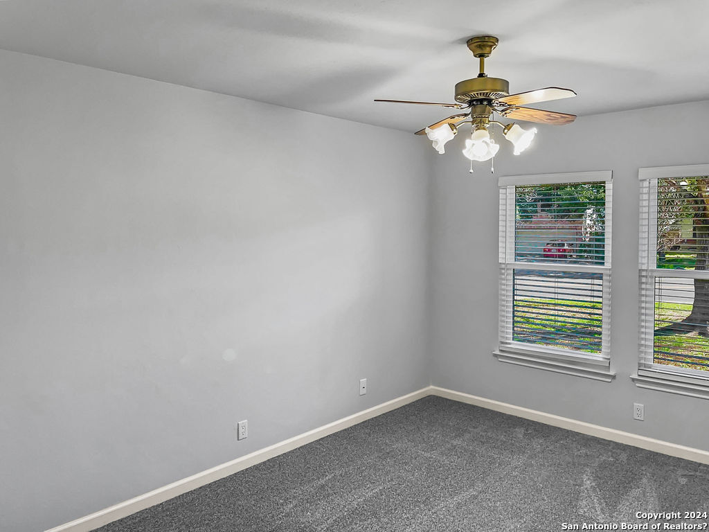 13211 Huntsman Road San Antonio, TX 78249 - Photo 21 of 33 a view of an empty room with a window