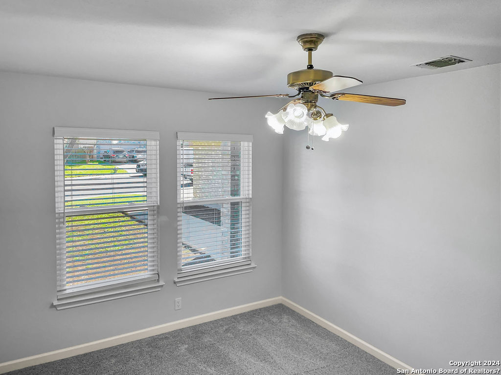 13211 Huntsman Road San Antonio, TX 78249 - Photo 22 of 33 a window in an empty room with a window