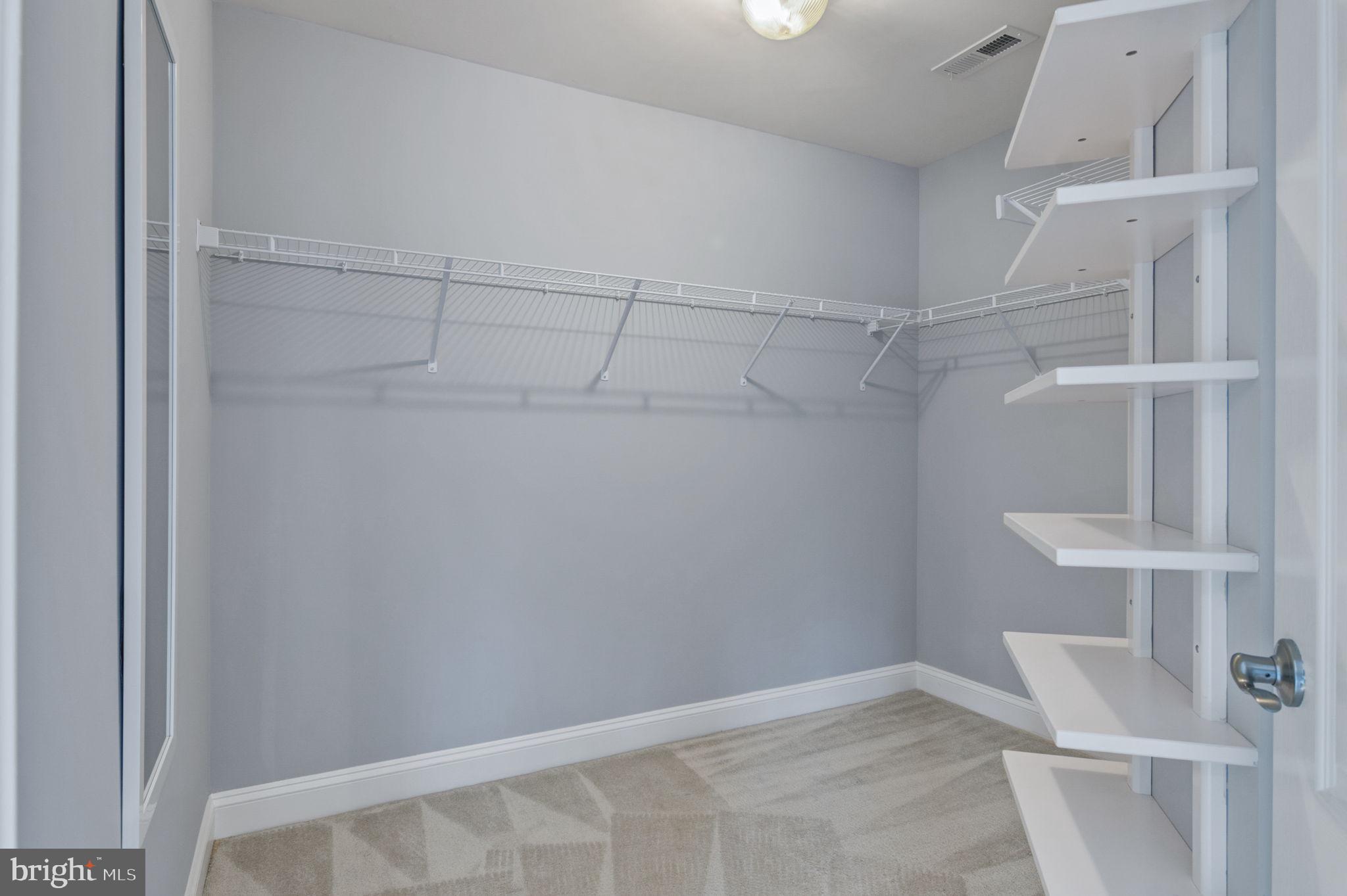 5893 Riverside Drive Woodbridge, VA 22193 - Photo 19 of 36 a view of an empty walk in closet