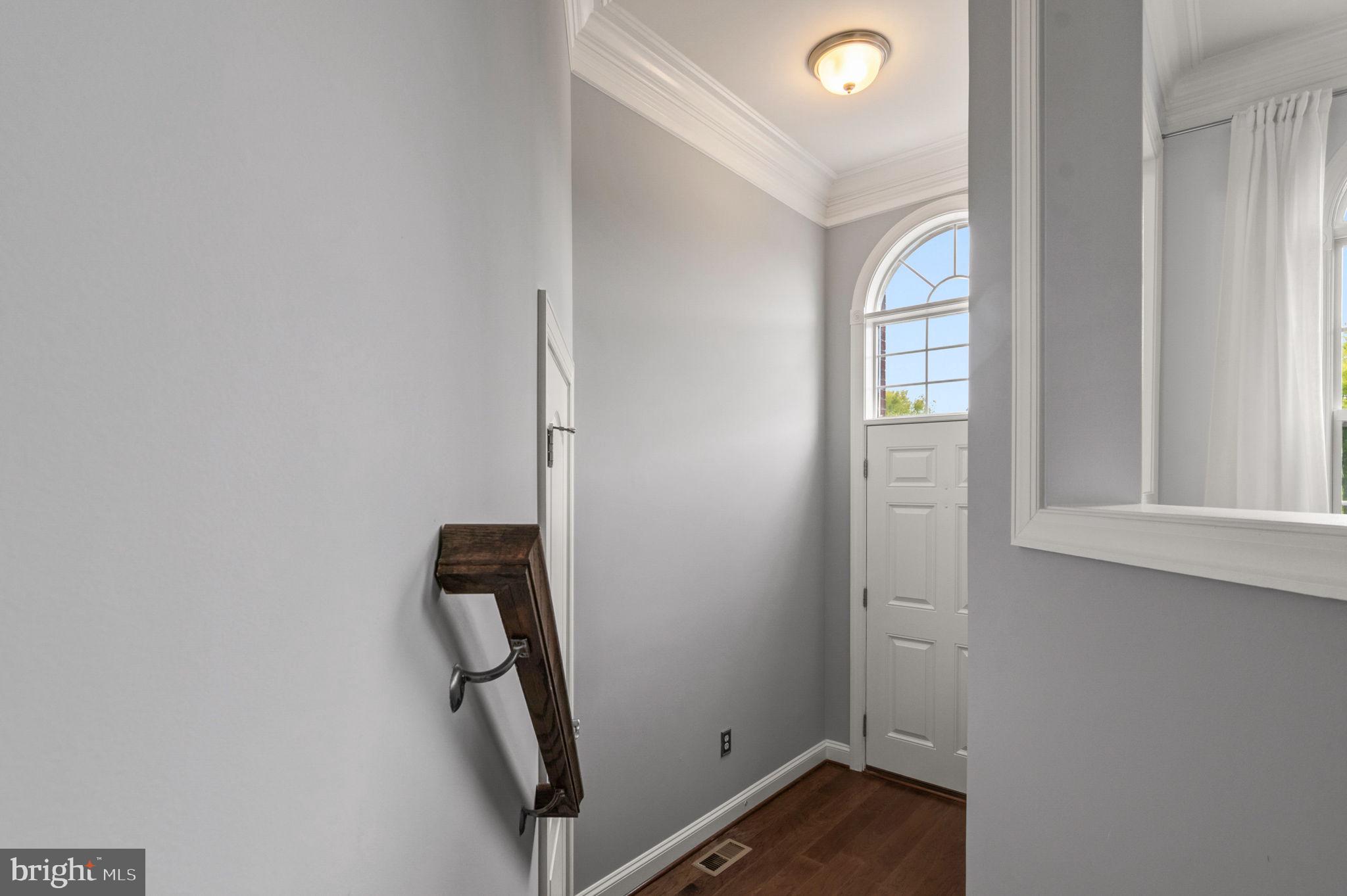 5893 Riverside Drive Woodbridge, VA 22193 - Photo 2 of 36 a view of room with window and hallway