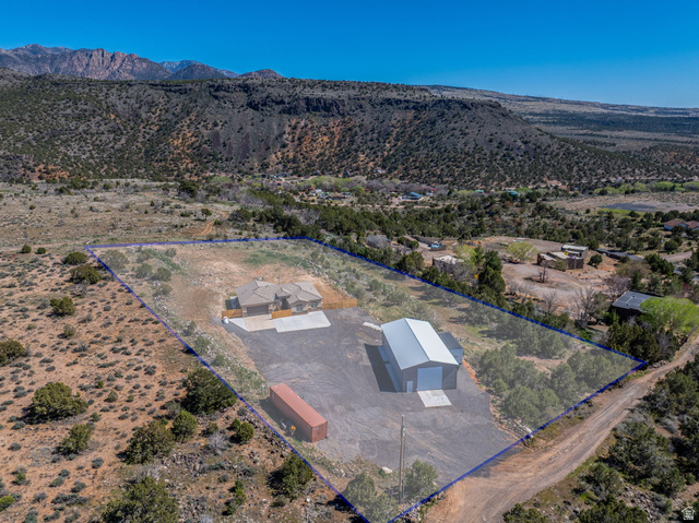 62 North Lucky 7 Road Veyo, UT 84782 - Photo 4 of 43 Aerial overview of property's location featuring property boundaries highlighted and mountains