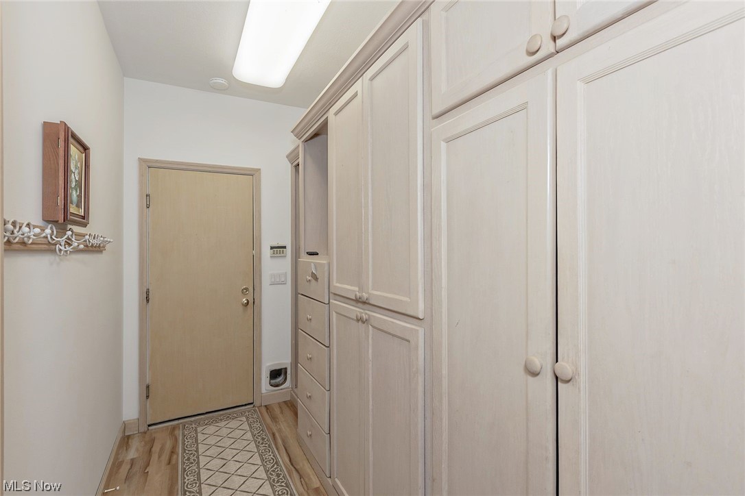 3850 Ellendale Road Moreland Hills, OH 44022 - Photo 15 of 39 Mud Room features built-in cabinetry and vinyl flooring