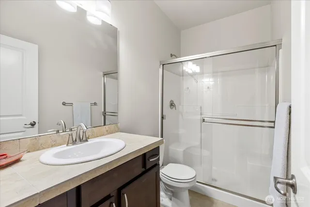 a view of a house with a yard and furniture