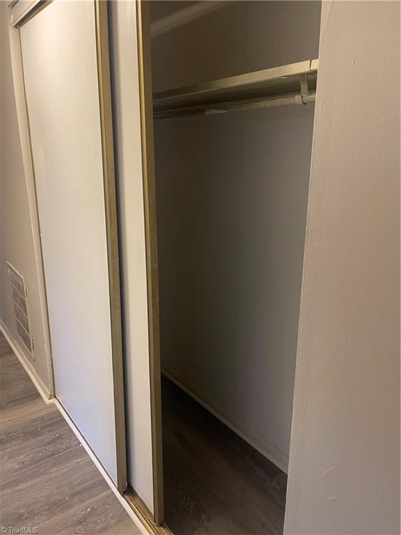2270 Sunderland Road, Unit 12A Winston-Salem, NC 27103 - Photo 15 of 38 LONG HALL DOUBLE DOOR CLOSET